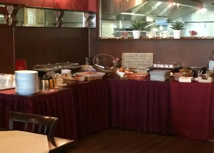 En Grand Café De Pauw Hotel