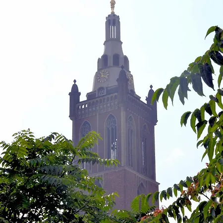 מלון En Grand Cafe De Pauw 2*