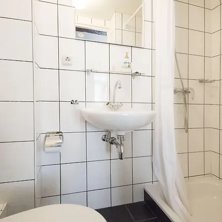 מלון En Grand Cafe De Pauw 2*