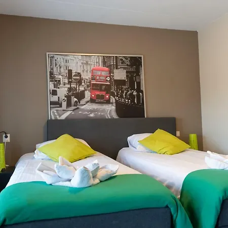 מלון En Grand Cafe De Pauw 2*